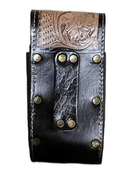 Black leather wallet with metal accents on a white background