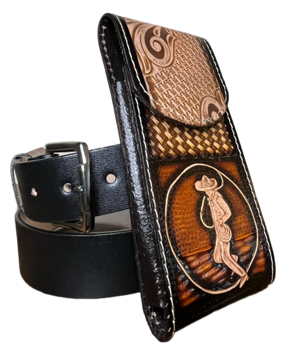 Decorative leather belt with intricate patterns on a black background