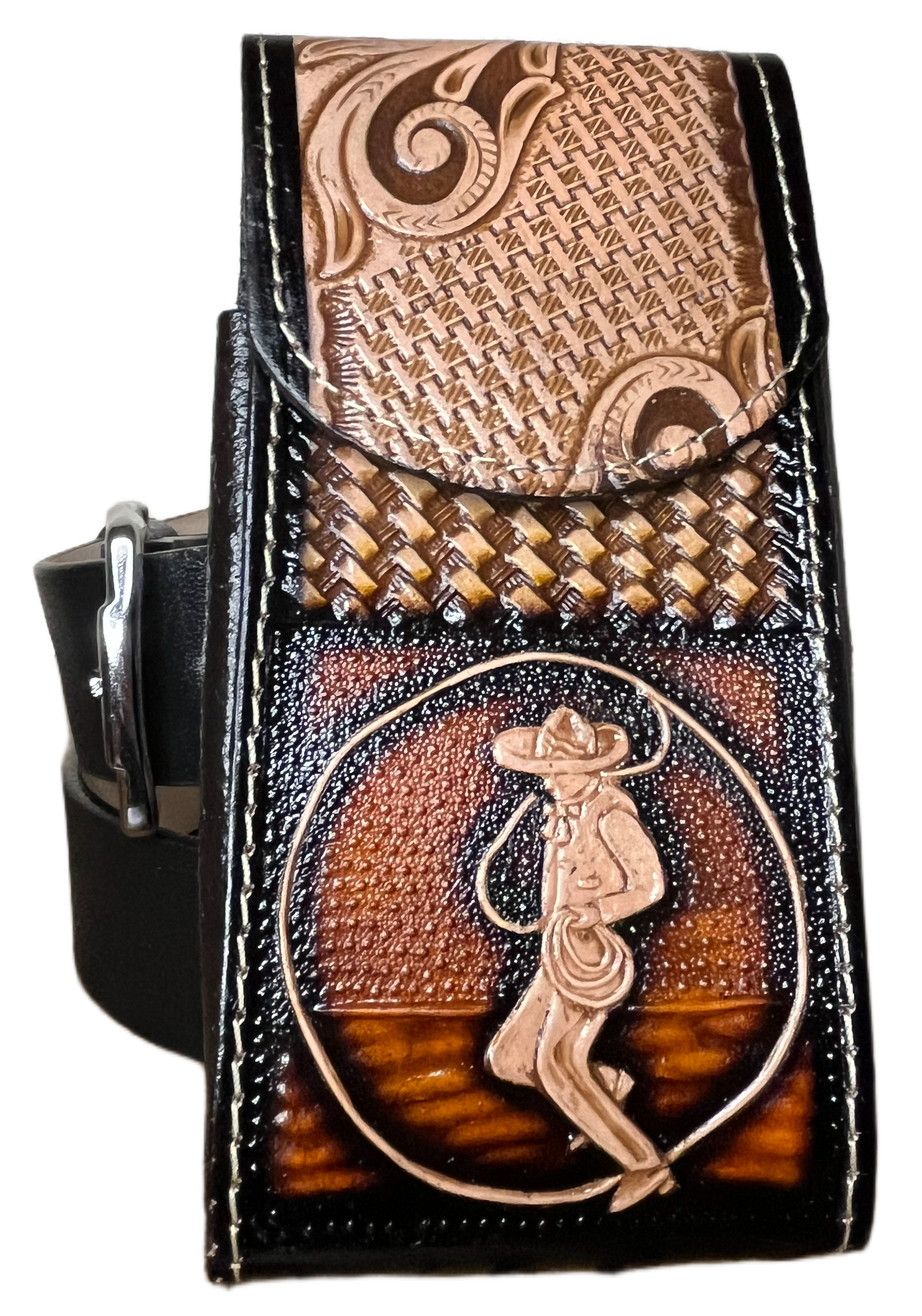 Decorative leather belt buckle with intricate designs on a black background