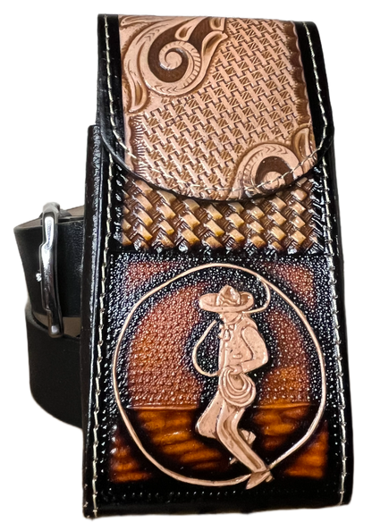 Decorative leather belt buckle with intricate designs on a black background