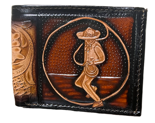 Brown leather wallet with embossed design on a black background