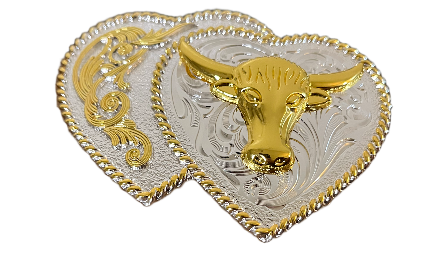 Decorative belt buckle with gold and silver design on a white background