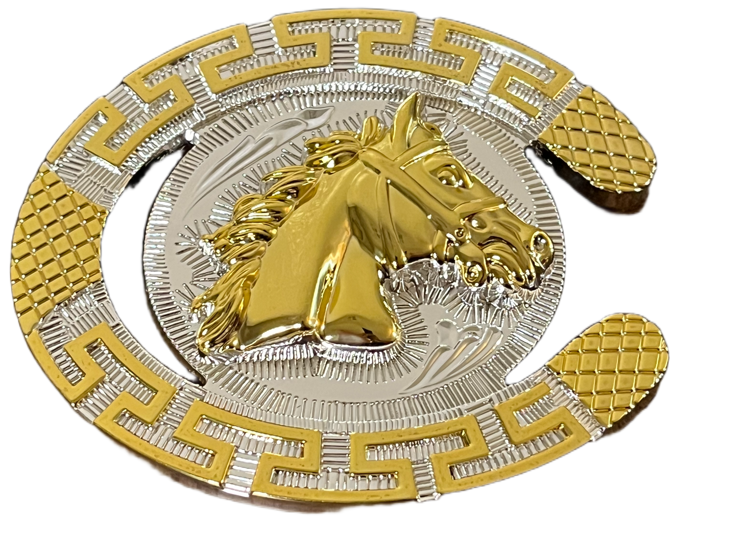 Gold and silver horse shoe with a horse head emblem on a white background