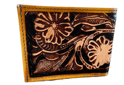 Leather cardholder with floral embossing on a black background