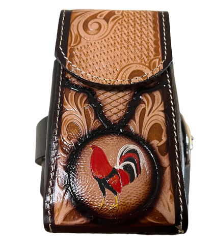 Decorative leather belt buckle with intricate patterns and a central design of a bird.